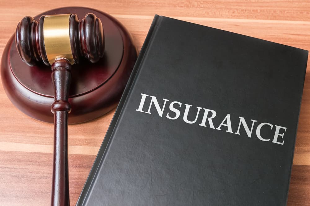 Book with insurance laws.